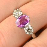 A pink sapphire and brilliant-cut diamond three-stone ring.