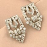 A pair of Art Deco platinum diamond clip brooches.