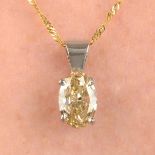An oval-shape natural Fancy Light Yellow Brown diamond single-stone pendant, with 9ct gold chain.