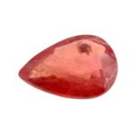 A pear shape orange sapphire weighing 2.53ct.