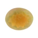 An oval shape opal weighing 2.45ct measuring 11.5 by 9.35 by 6mm.