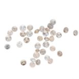 A selection of round brilliant-cut diamonds and 'brown' diamonds.