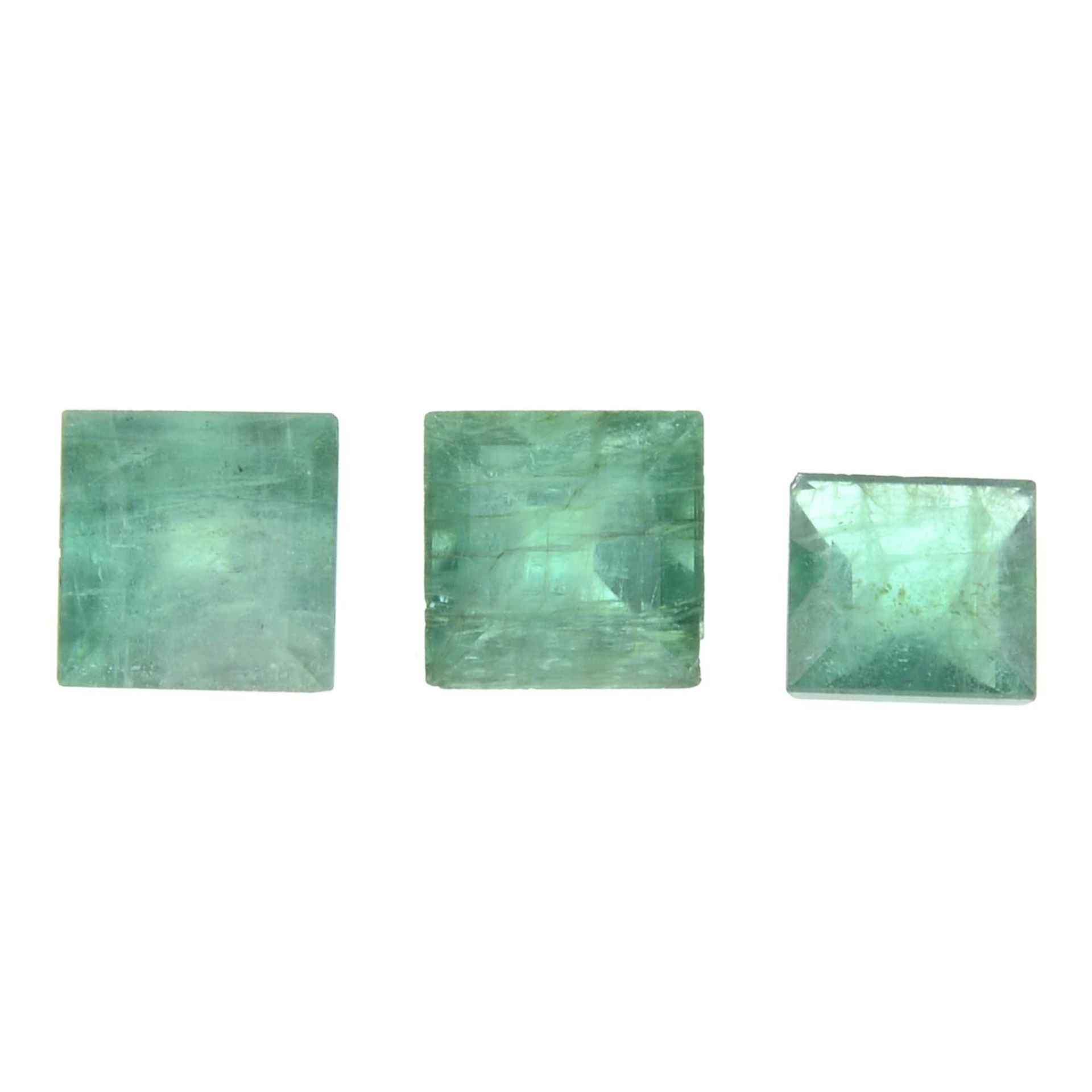 Six square-shape emeralds.