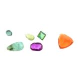 A selection of gemstones, to include opal, emerald, ruby, and further stones.