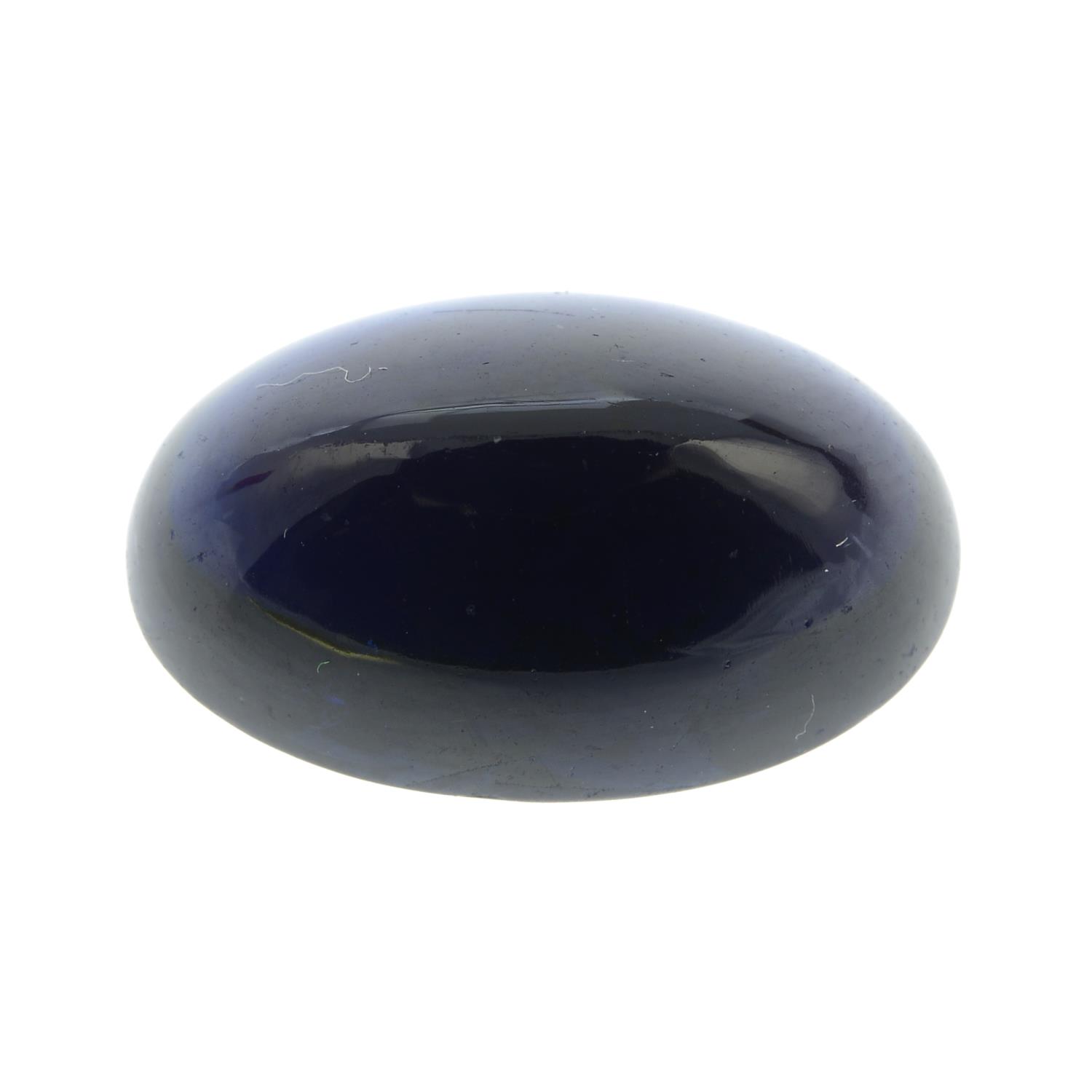 An oval shape blue sapphire cabochon weighing 15.17ct.