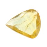 A pear shape yellow sapphire weighing 3.52ct measuring 12.73 by 11.2 by 2.25mm.