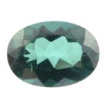 An oval shape green topaz 7.14ct measuring 14.15 by 10.15 by 6.45mm.