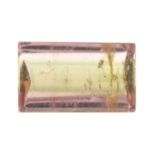 A rectangular shape bi-colour tourmaline weighing 6.81ct measuring 13.8 by 8.3 by 5.4mm.