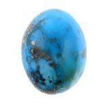 A turquoise cabochon weighing 52.25ct.