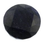 A circular-shape blue corundum, weighing 196gms.