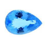 A pear shape blue topaz weighing 66.90ct.