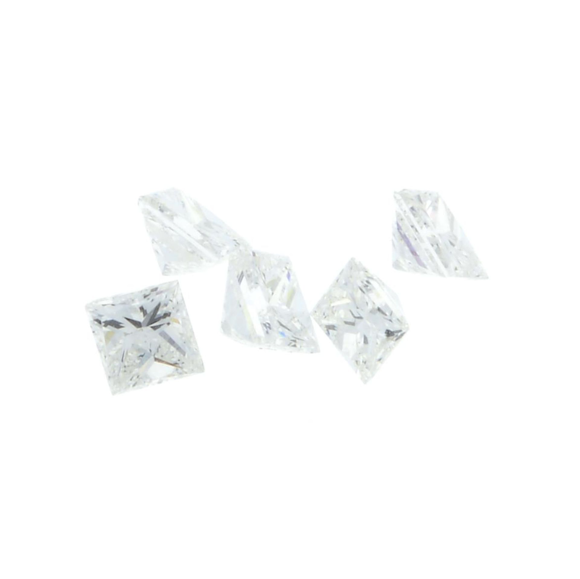 A selection of square-cut loose diamonds.