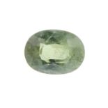 An oval shape green sapphire weighing 1.22ct measuring 7.37 by 5.5 by 3.32mm.