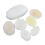 Selection of vari-shape moonstone and opal cabochons.