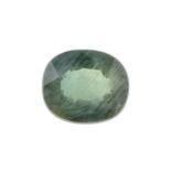 An oval shape bluish green sapphire weighing 1.18ct measuring 6.55 by 5.7 by 3.36mm.