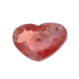 A heart shape orange sapphire weighing 2.47ct and measuring 6.9 by 10.1 by 4mm.