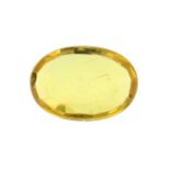 An oval shape yellow sapphire weighing 1.75ct measuring 9.92 by 7.2 by 2.1mm.