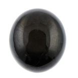 An oval shape black star sapphire weighing 33.65ct measuring 20.1 by 17.8 by 8mm.