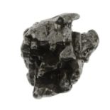 A rough meteorite weighing 28gms.