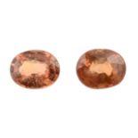 Twelve oval shape orange sapphires.