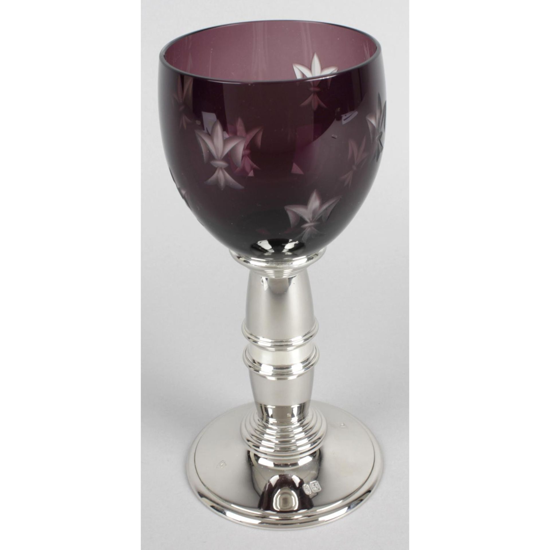 A modern silver mounted and amethyst glass goblet,