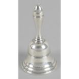 A modern silver table bell, of typical form, with reeded banding to body.