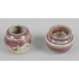 A Ruskin pottery sang-de-boeuf high temperature fired and glazed miniature vase,
