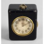 An unusual late 19th century or early 20th century pocket travel clock,