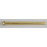 A Must de Cartier gold plated cased ballpoint pen, with vertical engine turned decoration.