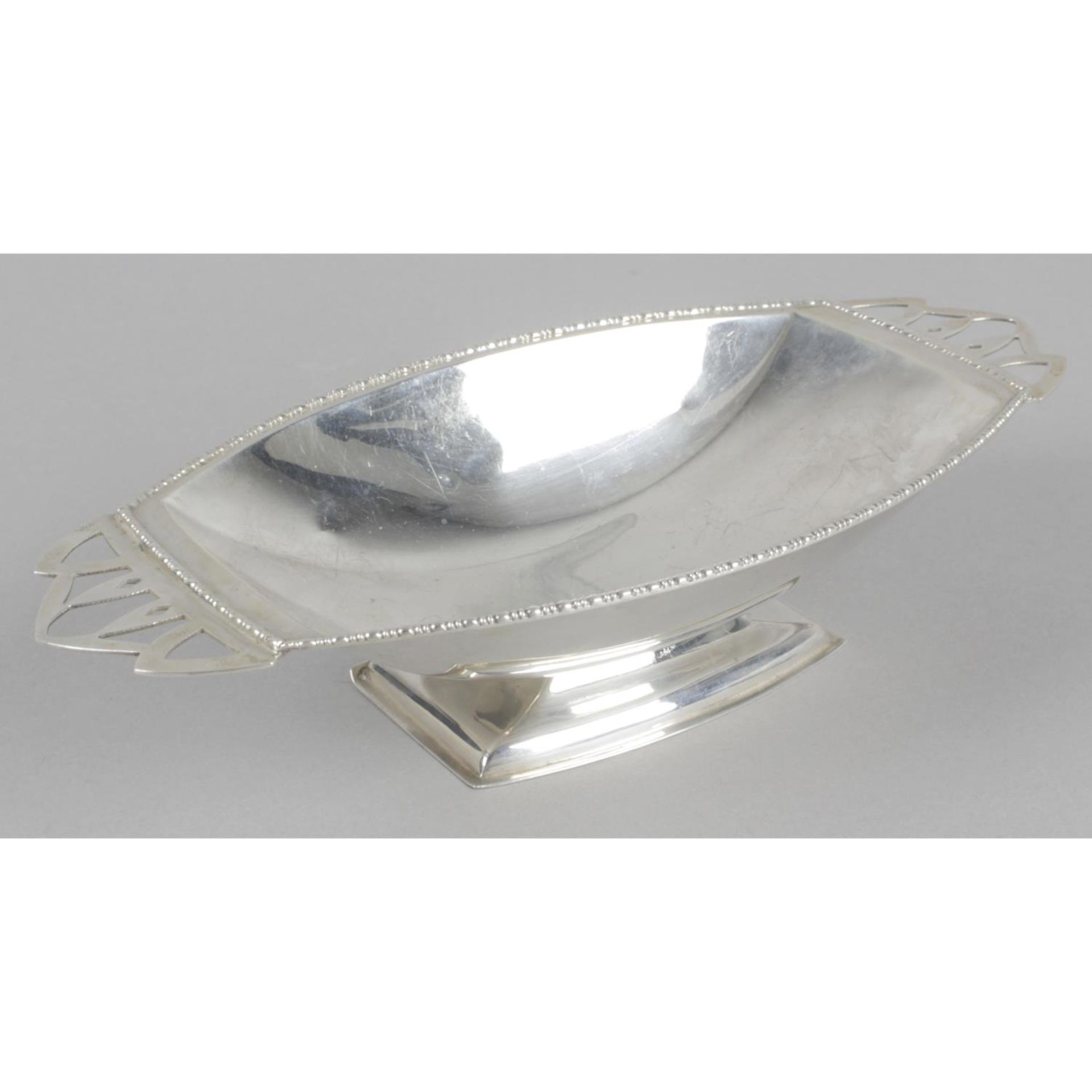 A small silver bonbon dish,