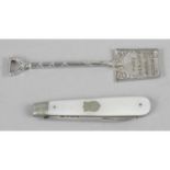 A 1930's silver commemorative butter spade,