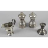 Two matched modern silver salt and pepper mills,