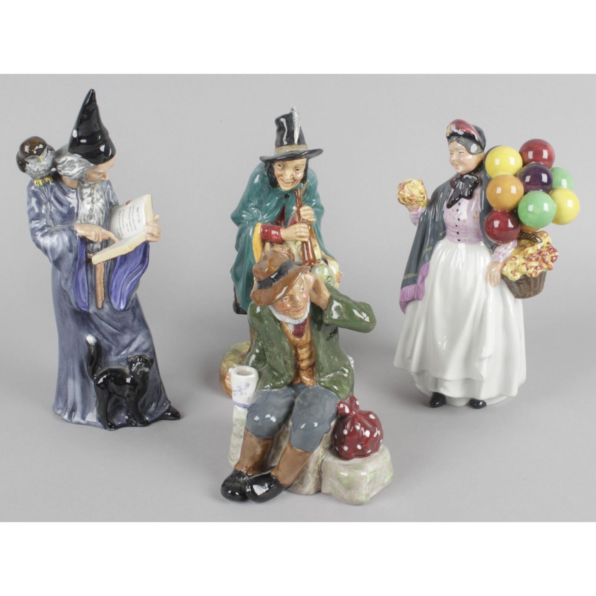 A collection of assorted Royal Doulton figurines,