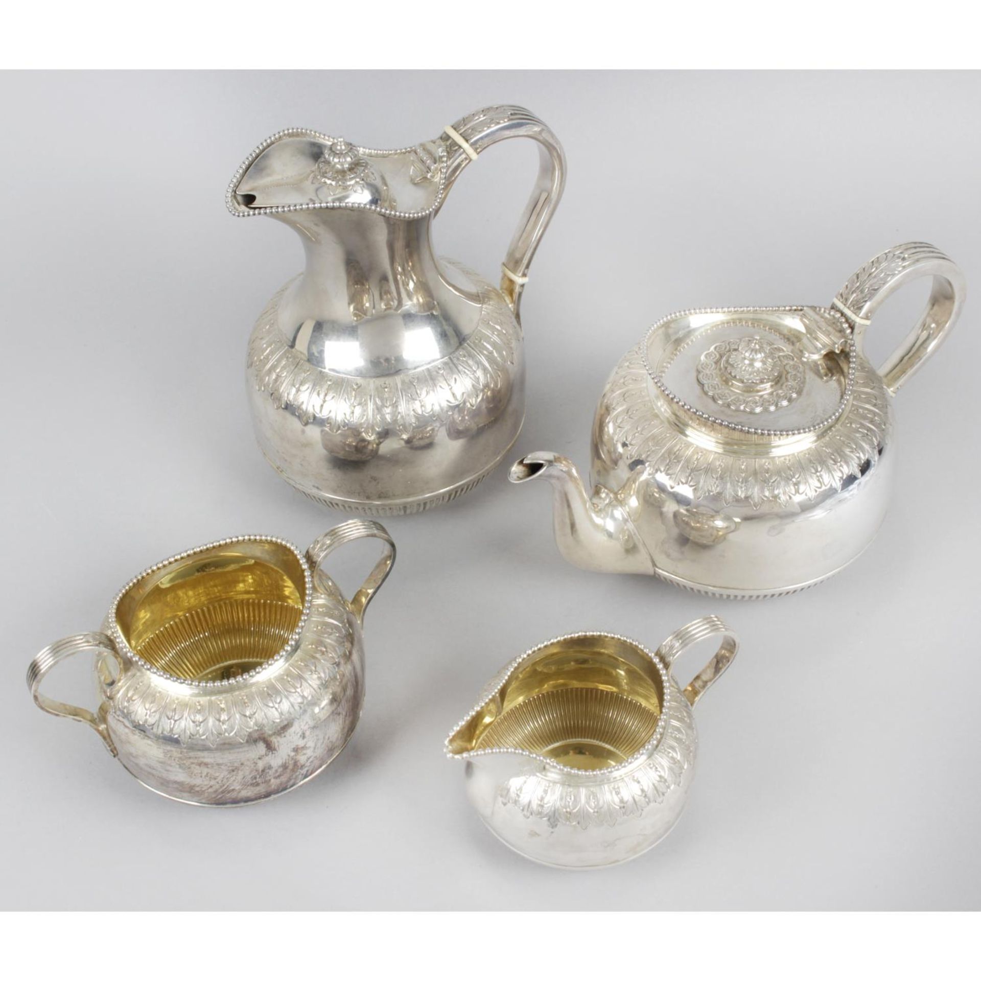 A late Victorian silver matched three piece tea service,