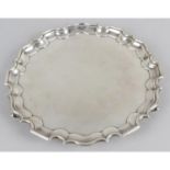 A 1920's circular silver salver,