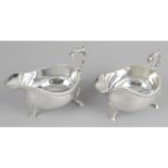 A pair of modern silver sauce boats,