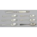 An assortment of silver and silver handled cutlery,