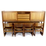 An Elliott's of Newbury stained wooden modular dining room group,
