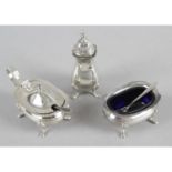 A mid-20th century silver three piece condiment set,