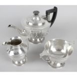 An early George V silver three piece tea service,