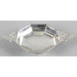 Art Deco style twin-handled small bowl with pierced handles and footed base.