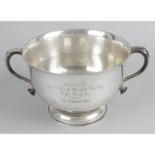 A silver twin-handled bowl,