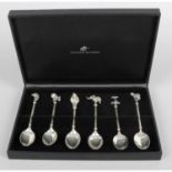 A cased and matched set of six silver coffee spoons,