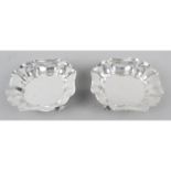 A pair of 1930's small silver dishes,