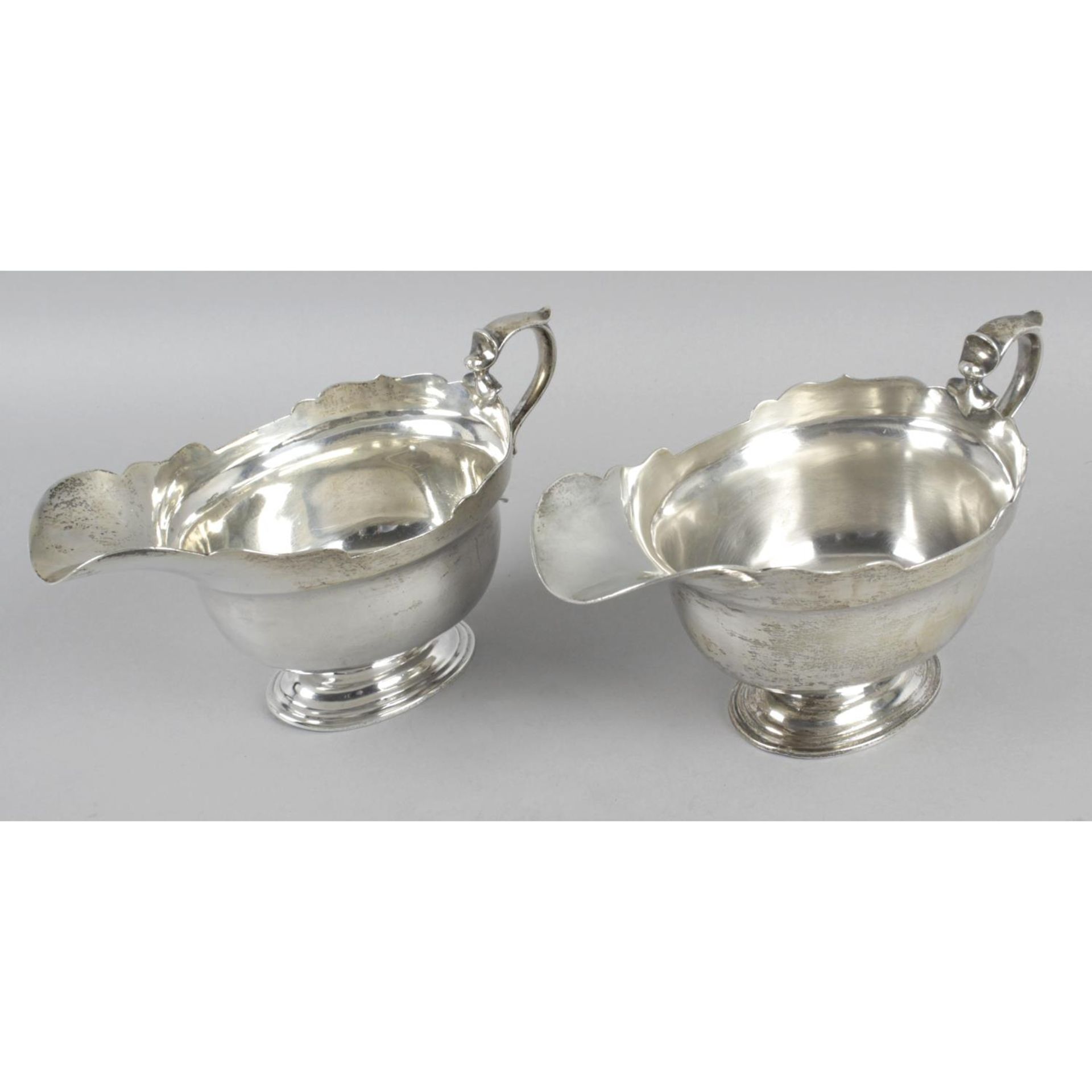 A pair of Edwardian silver sauce boats,