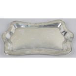 An Edwardian silver dressing table tray,