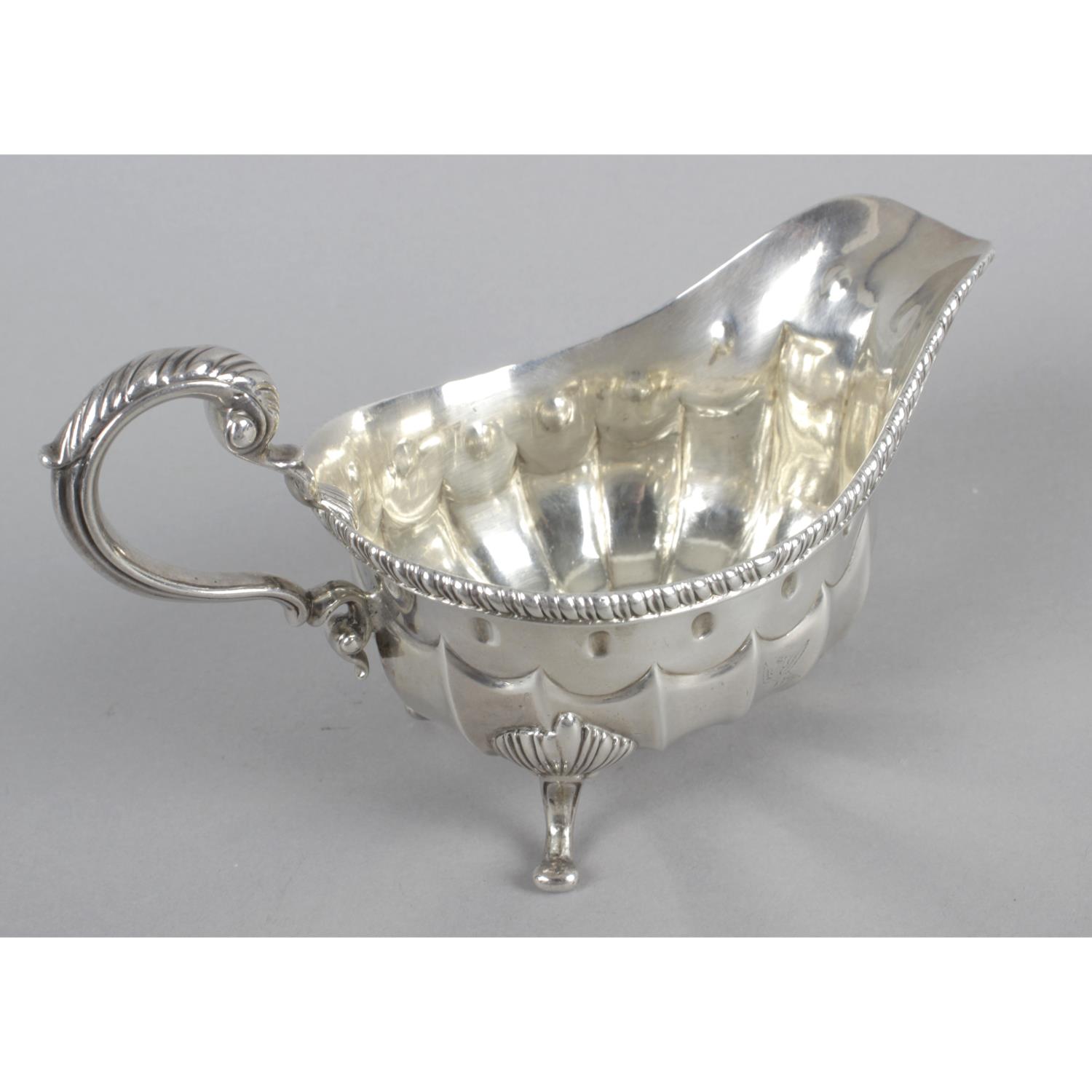A late George III silver sauce boat, - Image 2 of 3