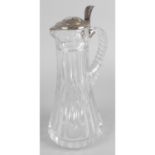 A heavy silver mounted cut glass jug,