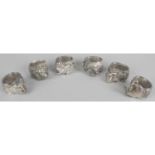 A set of six napkin rings,