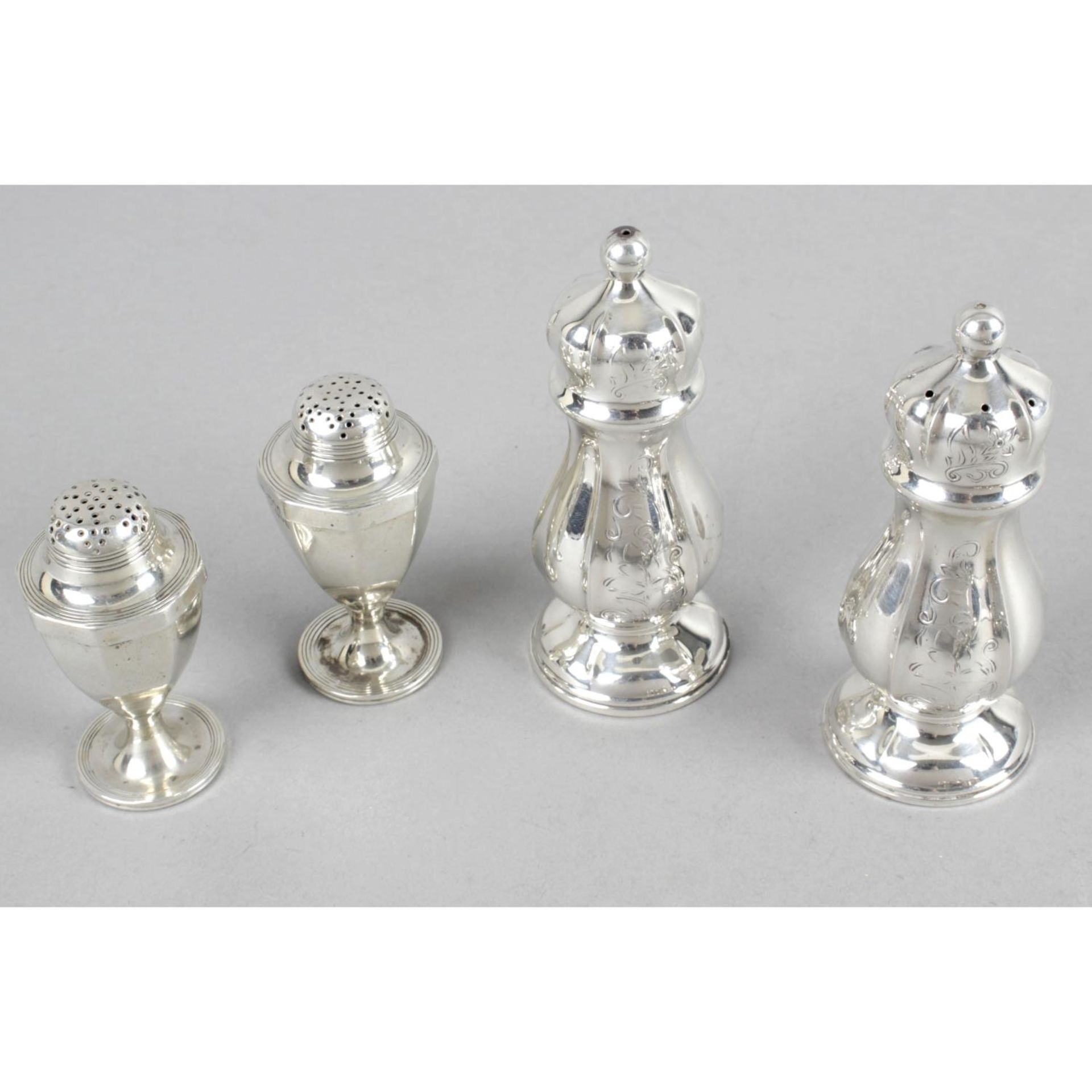 Two pairs of salts and peppers and four other condiment pieces - an urn shaped pair - London 1906